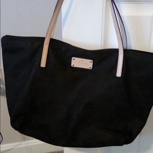 Kate Spade tote. Black exterior with tan handles